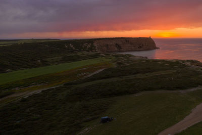 Scenic view of sea against sky during sunset