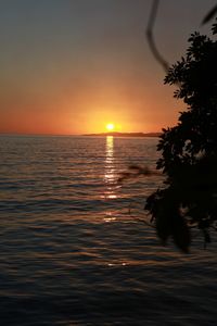 Scenic view of sea at sunset