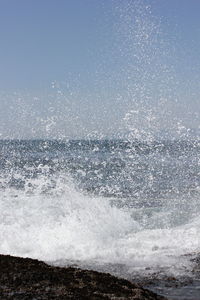 Waves breaking on beach