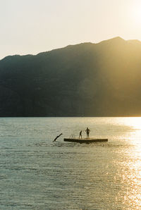Scenic view of lago di garda in italy during sunset. shot on 35mm kodak portra 800 film.