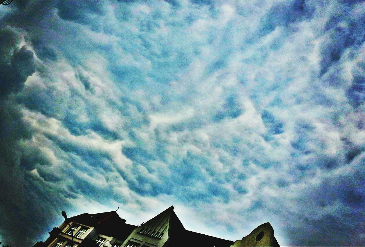 cloud - sky, low angle view, architecture, no people, sky, building exterior, roof, built structure, day, outdoors, nature, beauty in nature