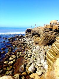 View of sea against clear blue sky