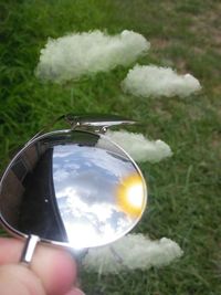 Close-up of person holding umbrella