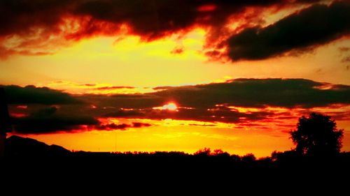 Scenic view of dramatic sky during sunset