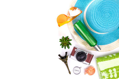 High angle view of hat on table against white background