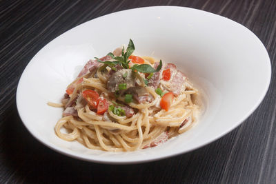 Close-up of noodles in bowl on table