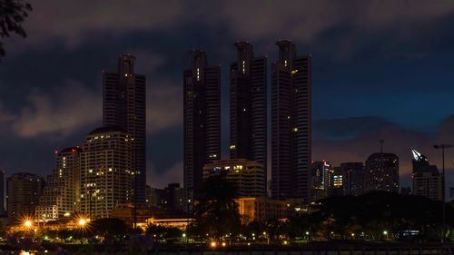 Illuminated buildings in city at night,bangkok,thailand