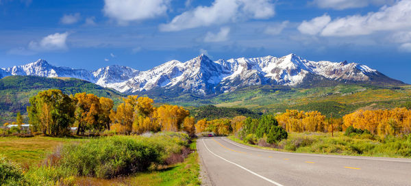 Scenic view of snowcapped mountains against sky