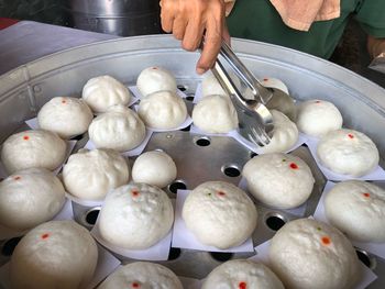 High angle view of steamed bun in container