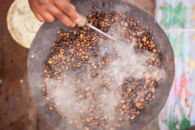 Close-up of man preparing food