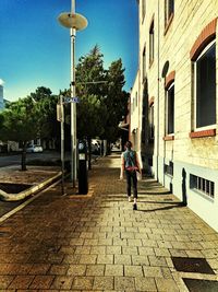 People walking on street in city