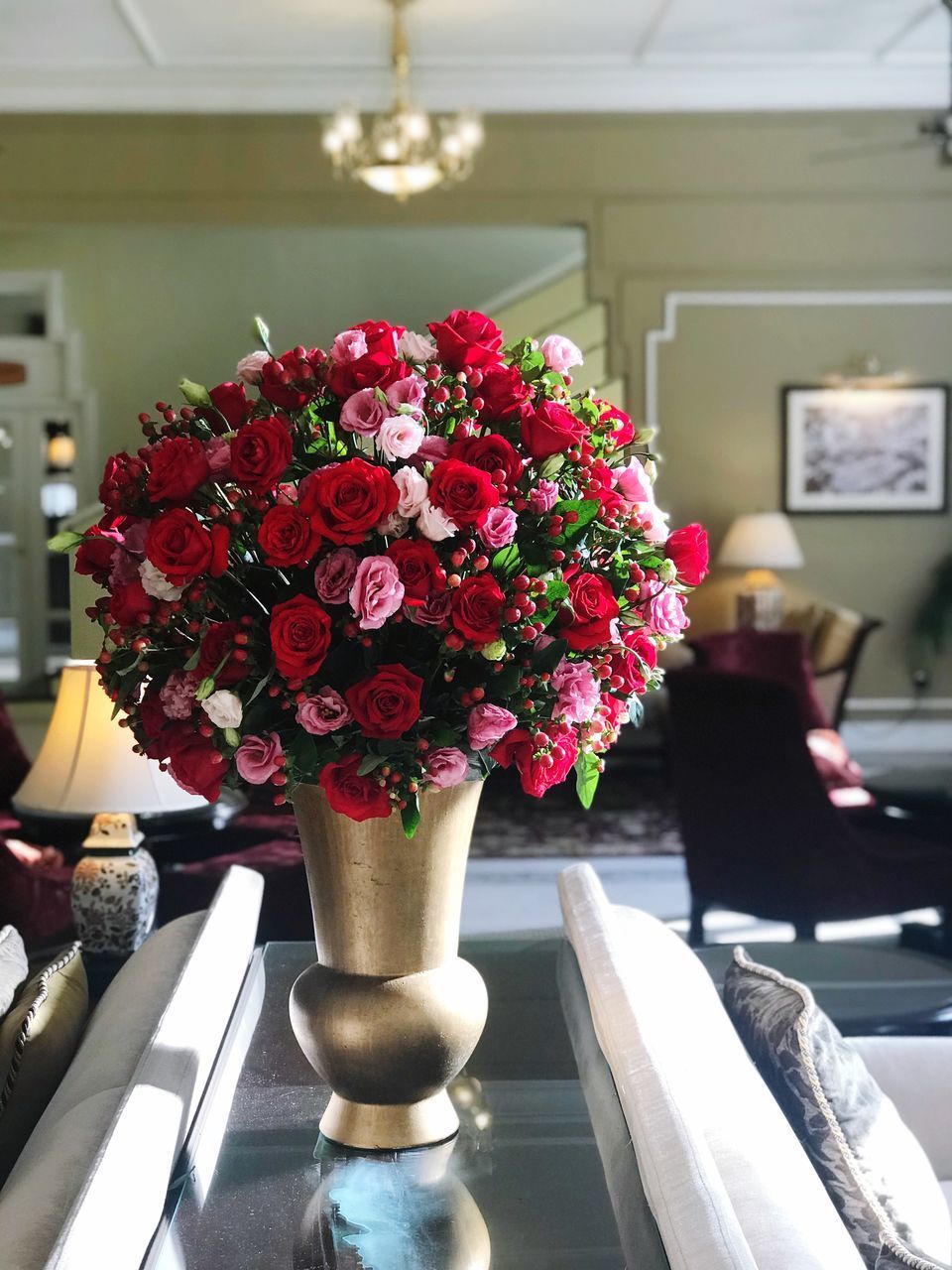 CLOSE-UP OF FLOWERS IN VASE