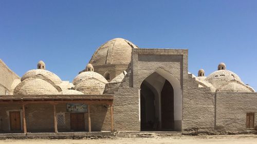 Exterior of temple against clear sky