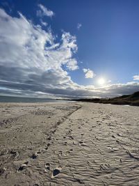 Scenic view of beach against sky
