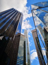 Low angle view of modern buildings against sky