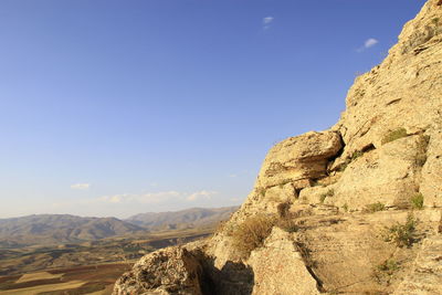 Scenic view of mountains against clear sky