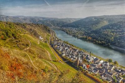 High angle view of river amidst landscape against sky