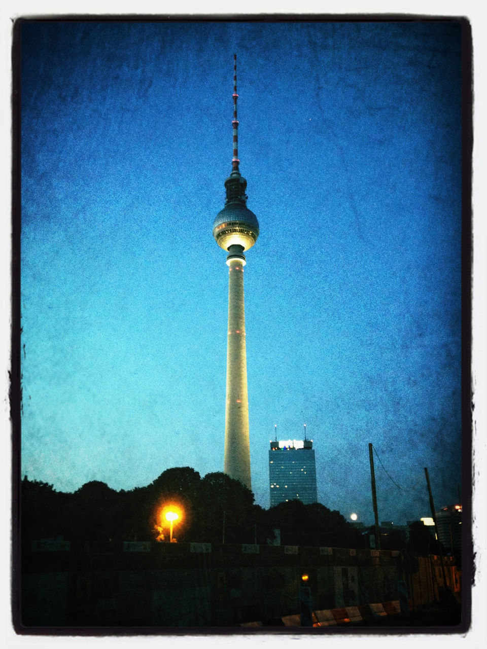 communications tower, tower, architecture, tall - high, built structure, building exterior, transfer print, fernsehturm, communication, spire, television tower, auto post production filter, low angle view, sky, travel destinations, city, sphere, international landmark, famous place, capital cities