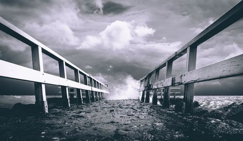 Bridge over water against sky