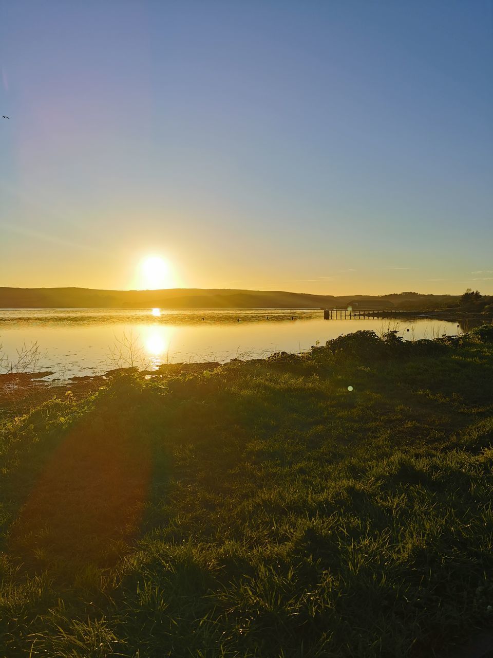 SCENIC VIEW OF SUNSET OVER LAND