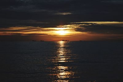 Scenic view of sea at sunset