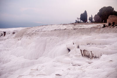 Scenic view of frozen sea against sky