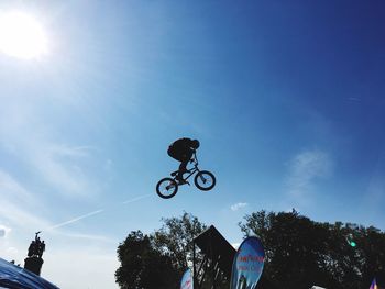 Low angle view of man against sky