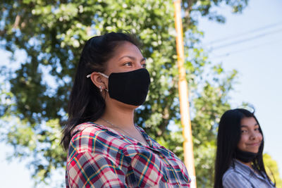 Young women wearing face mask