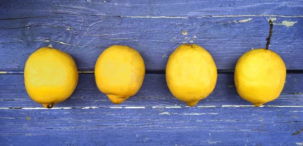 Close-up of fruits on wood