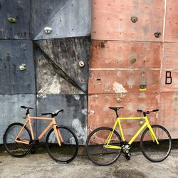 Bicycle leaning on wall