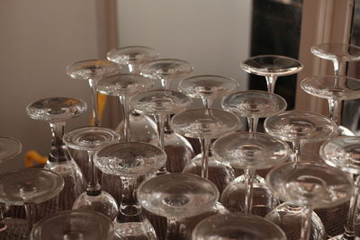 Close-up of wine glasses on table