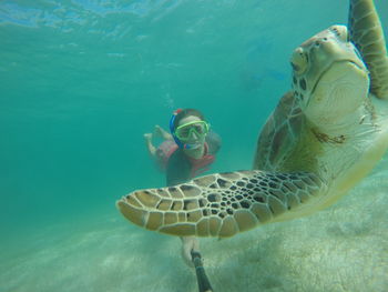 Woman snorkeling undersea