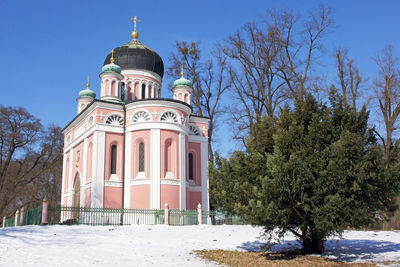 View of clock tower against blue sky