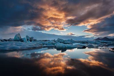 Scenic view of sea against sky during sunset