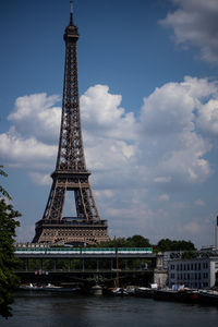 View of tower against cloudy sky