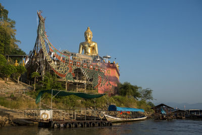 Traditional temple against clear sky