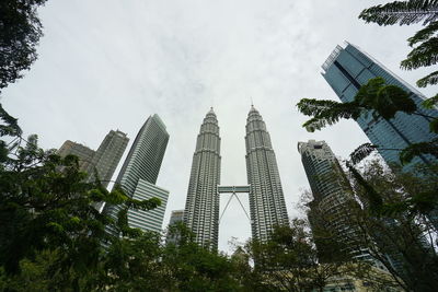 Low angle view of skyscrapers against sky