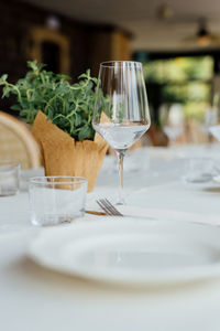 Close-up of wineglasses on table