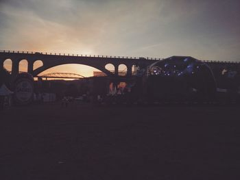 Bridge against sky in city