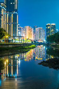 The view night cityscape around waduk kebon melati. jakarta, indonesia. long exposure.