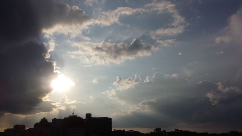 Low angle view of cloudy sky at sunset