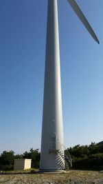 Low angle view of built structure against clear blue sky
