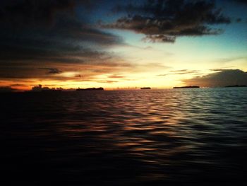 Scenic view of sea at sunset