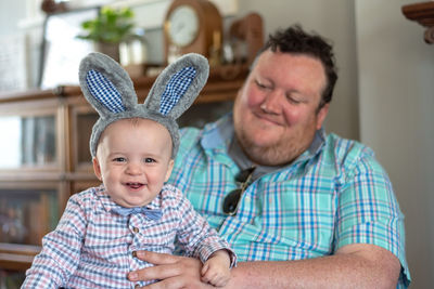 Portrait of happy baby boy with father