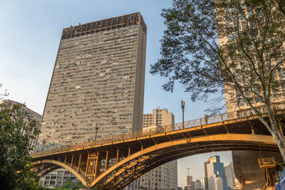 Low angle view of bridge against clear sky