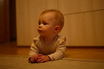 Portrait of cute baby boy at home