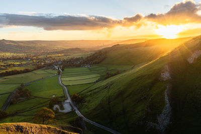 Scenic view of landscape against sky during sunset