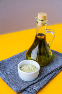 Sesame with oil in glass bottle. healthy food concept. vegan keto diet. healthy 