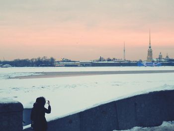 People on snow covered landscape