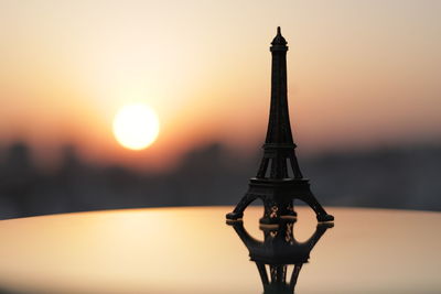 Close-up of tower against sky during sunset